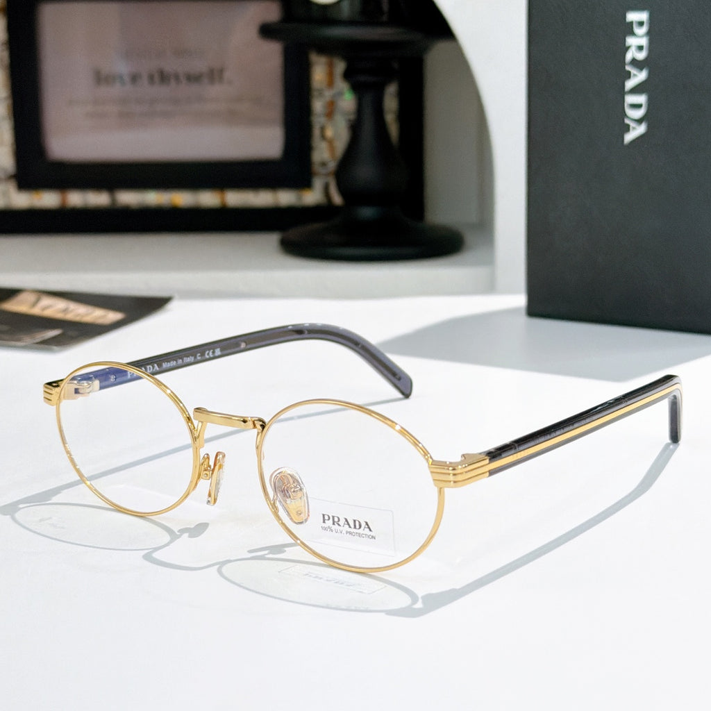 Prada eyeglasses with round gold frames and dark gray striped temples