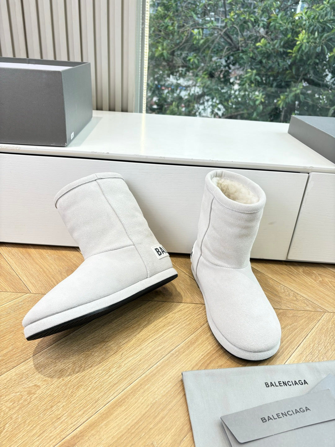 Balenciaga ladies luxury ankle boots, light white suede with interior fleece and logo on side