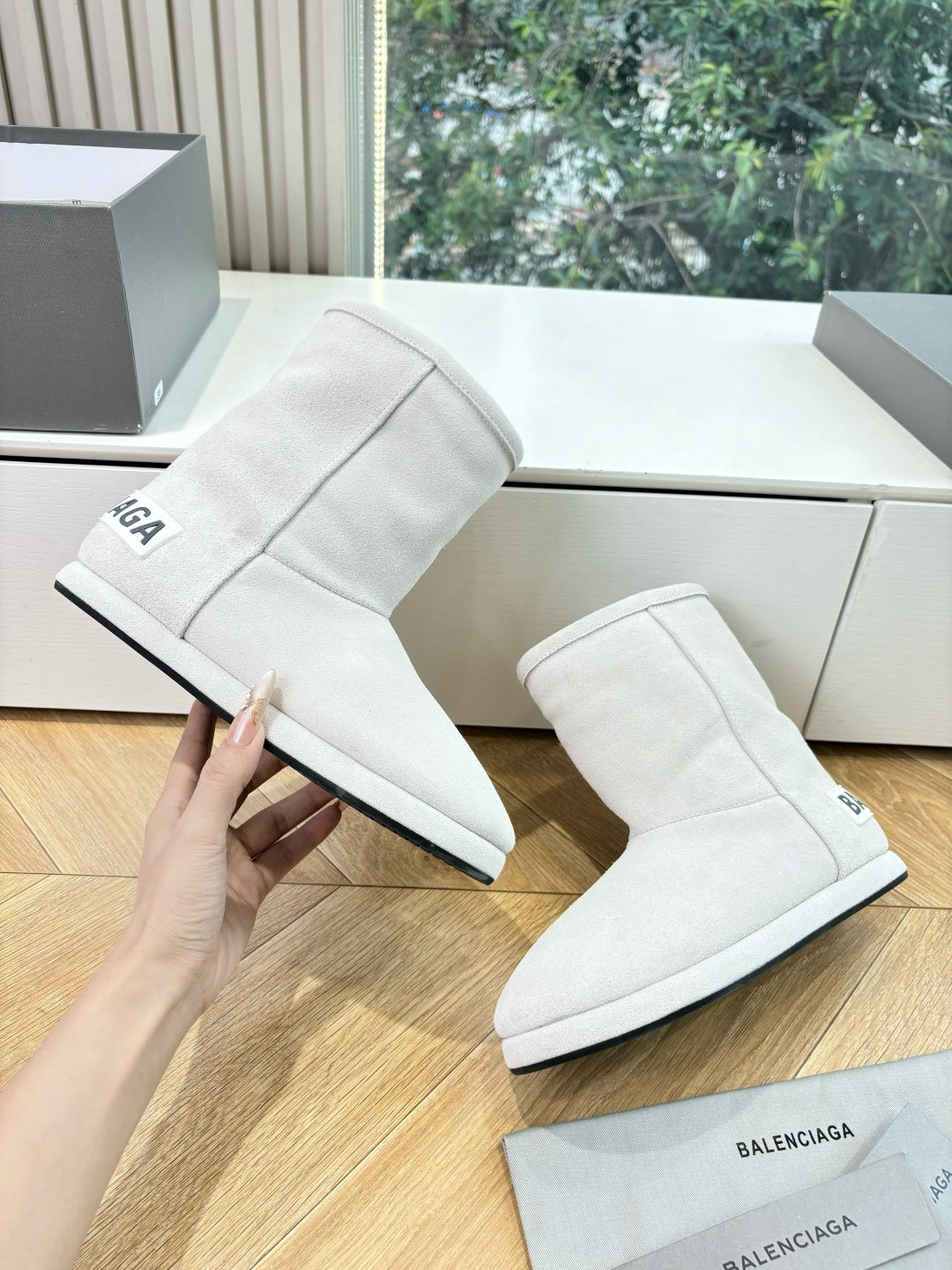 Balenciaga ladies luxury ankle boots, light white suede pull-on, shown from side