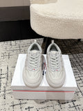 White low-top sneakers with lace-up front, Moncler logo detail