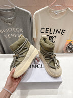 Moncler lace-up sneaker held in hand, beige upper with olive laces and side logo
