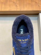 Prada unisex sneaker tongue and lace area in dark blue, Prada Milano branding