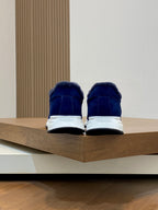 Prada unisex sneakers in dark blue, rear view with white heel trim