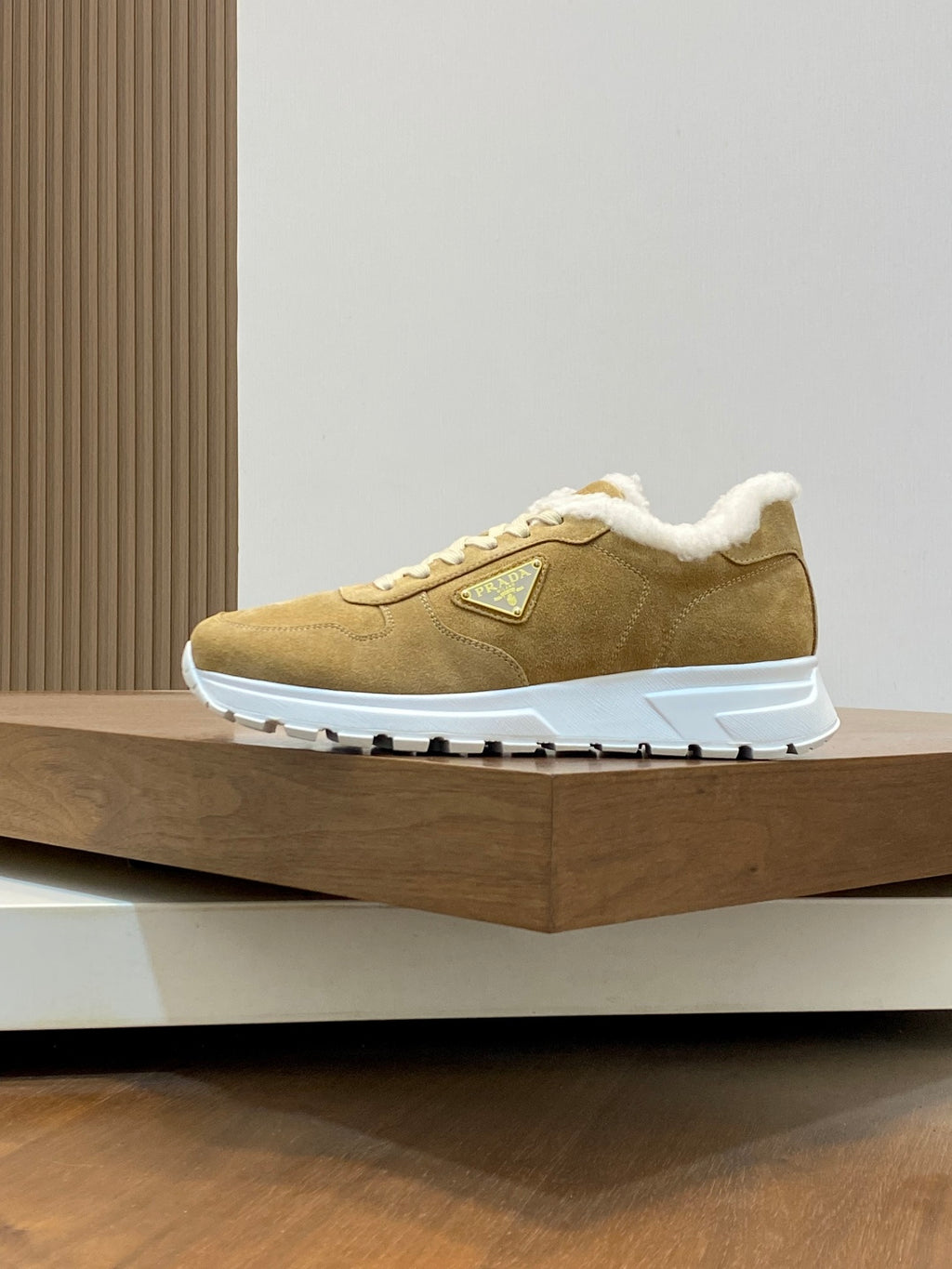 Prada unisex suede low-top sneakers in tan with white laces and cozy shearling collar