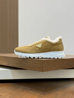Prada unisex suede low-top sneakers in tan with white laces and cozy shearling collar