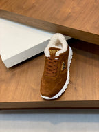 Brown suede lace-up sneaker with shearling collar and white sole, Prada logo