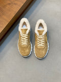 Prada unisex suede sneakers with white laces, tan fur trim, and thick white sole