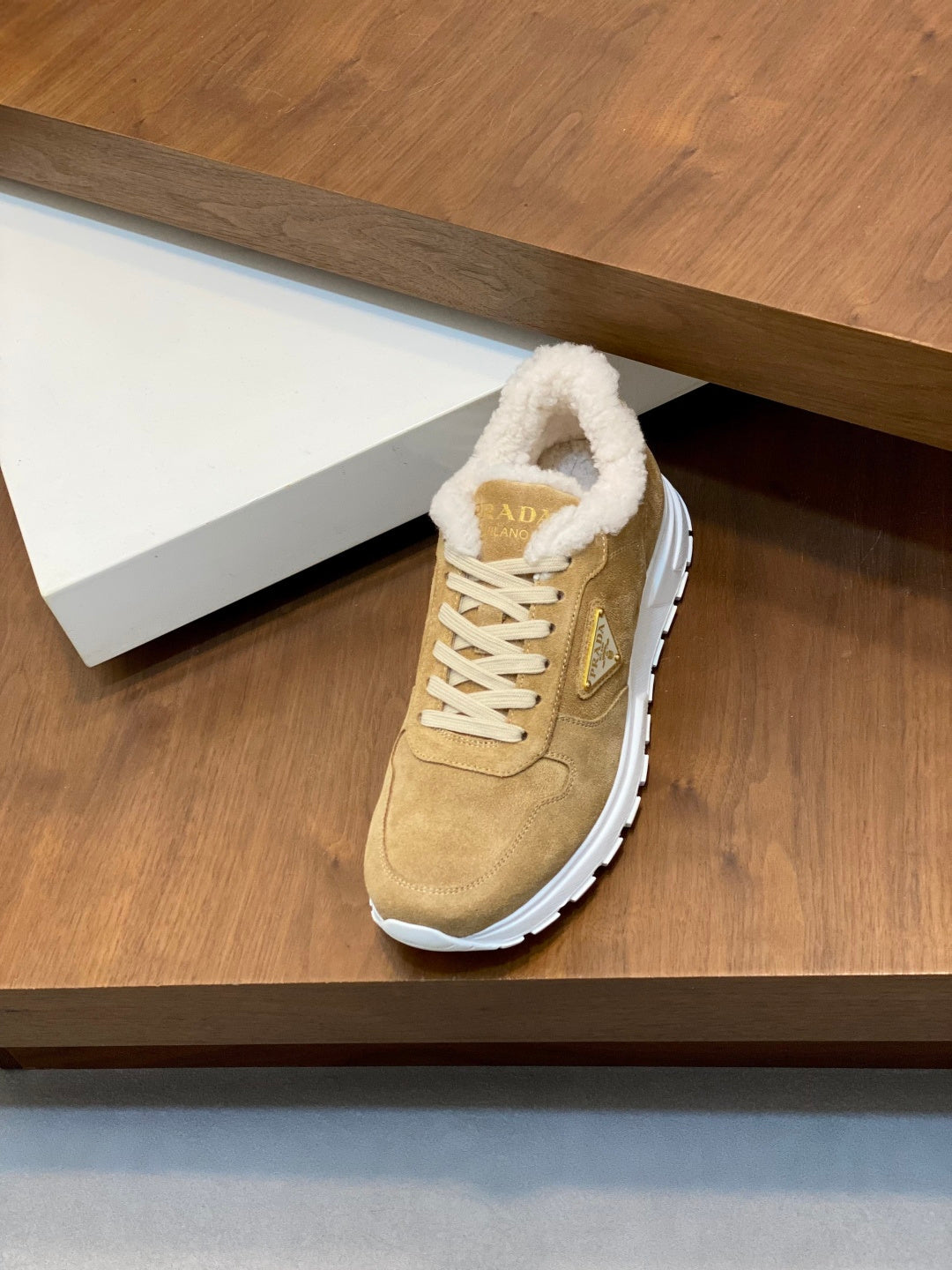 Prada unisex tan suede sneakers with white laces and white rubber sole detail