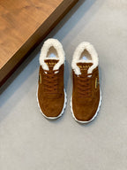 Brown suede lace-up sneakers with white sole, shearling collar, Prada logo