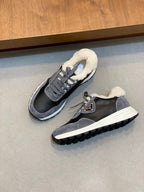Prada unisex sneakers pair view, dark navy/gray with fleece lining, lace-up, cushioned sole.