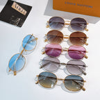 Assorted round sunglasses with gold frames and multicolor tinted lenses