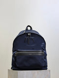 YSL navy nylon backpack with front zip pocket and top drawcord closure