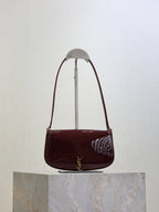 YSL mini shoulder bag in burgundy patent leather, curved flap with gold YSL clasp