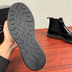 Prada chelsea boot outsole, gray tread with PRADA text on the heel area