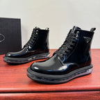 Black lace-up ankle boots with side logo patch and thick tread sole