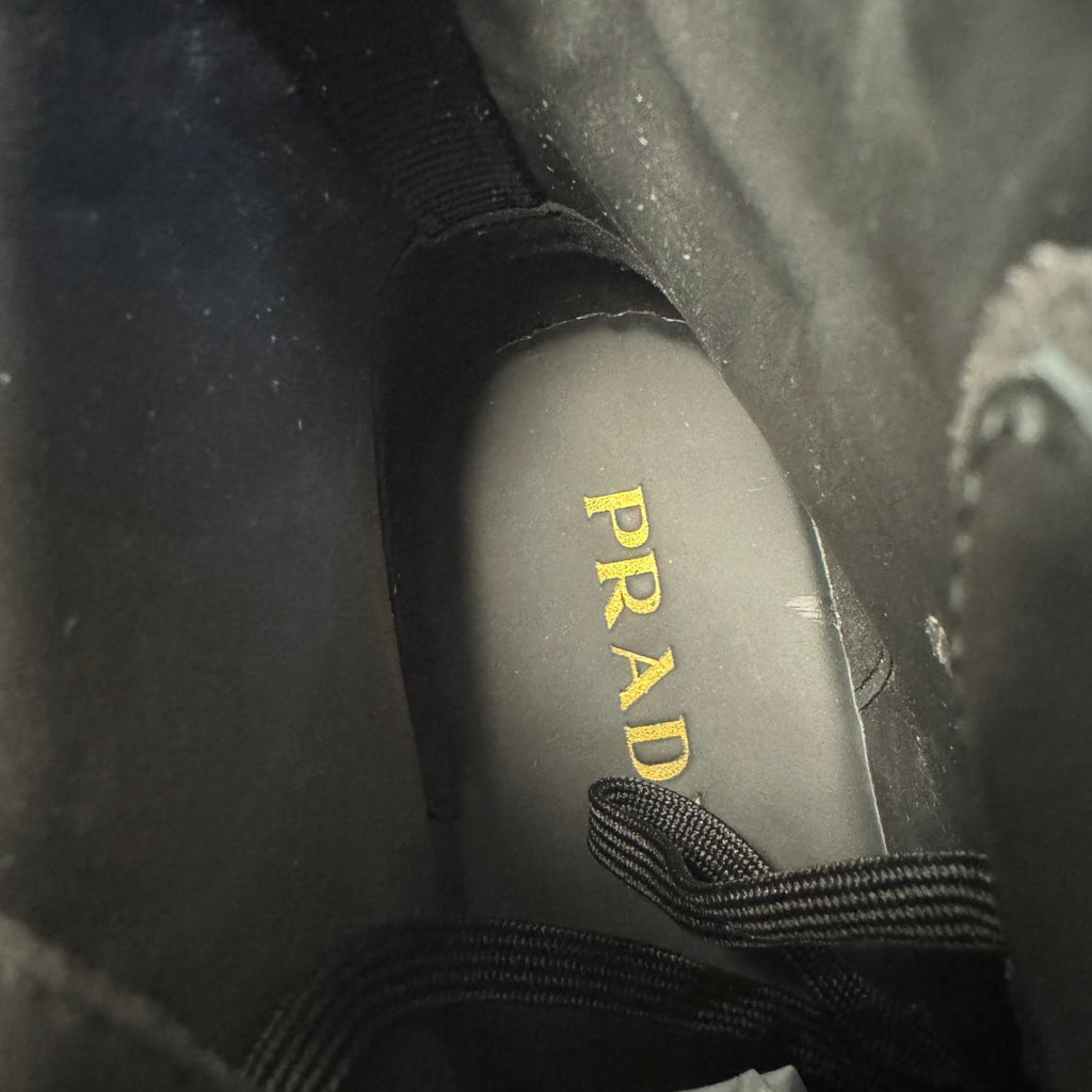 Black insole lining with gold PRADA logo text