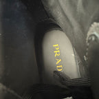 Black insole lining with gold PRADA logo text