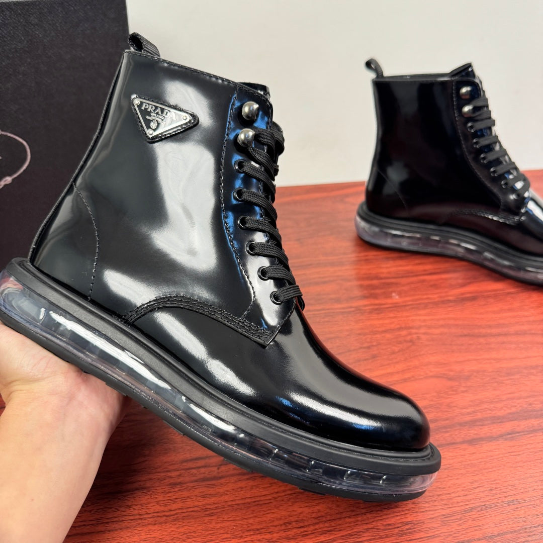Black lace-up ankle boots with side Prada badge and chunky sole