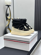 Moncler lace-up high-top sneakers, black fabric and cream rubber sole