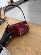 YSL burgundy glossy mini shoulder bag with gold-tone YSL logo