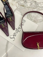 YSL burgundy small shoulder bag with gold YSL logo and curved top handle