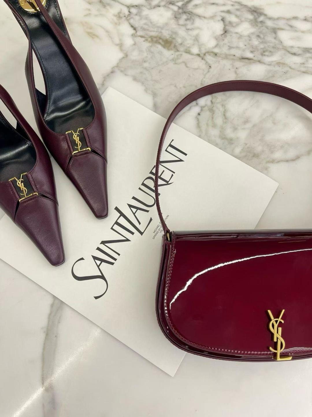 YSL burgundy small shoulder bag with gold YSL logo and curved top handle