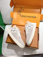 White Louis Vuitton high-top sneakers with monogram pattern and shearling lining