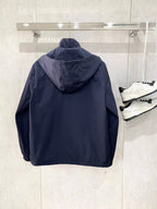Navy Moncler long hooded jacket back view with full hood