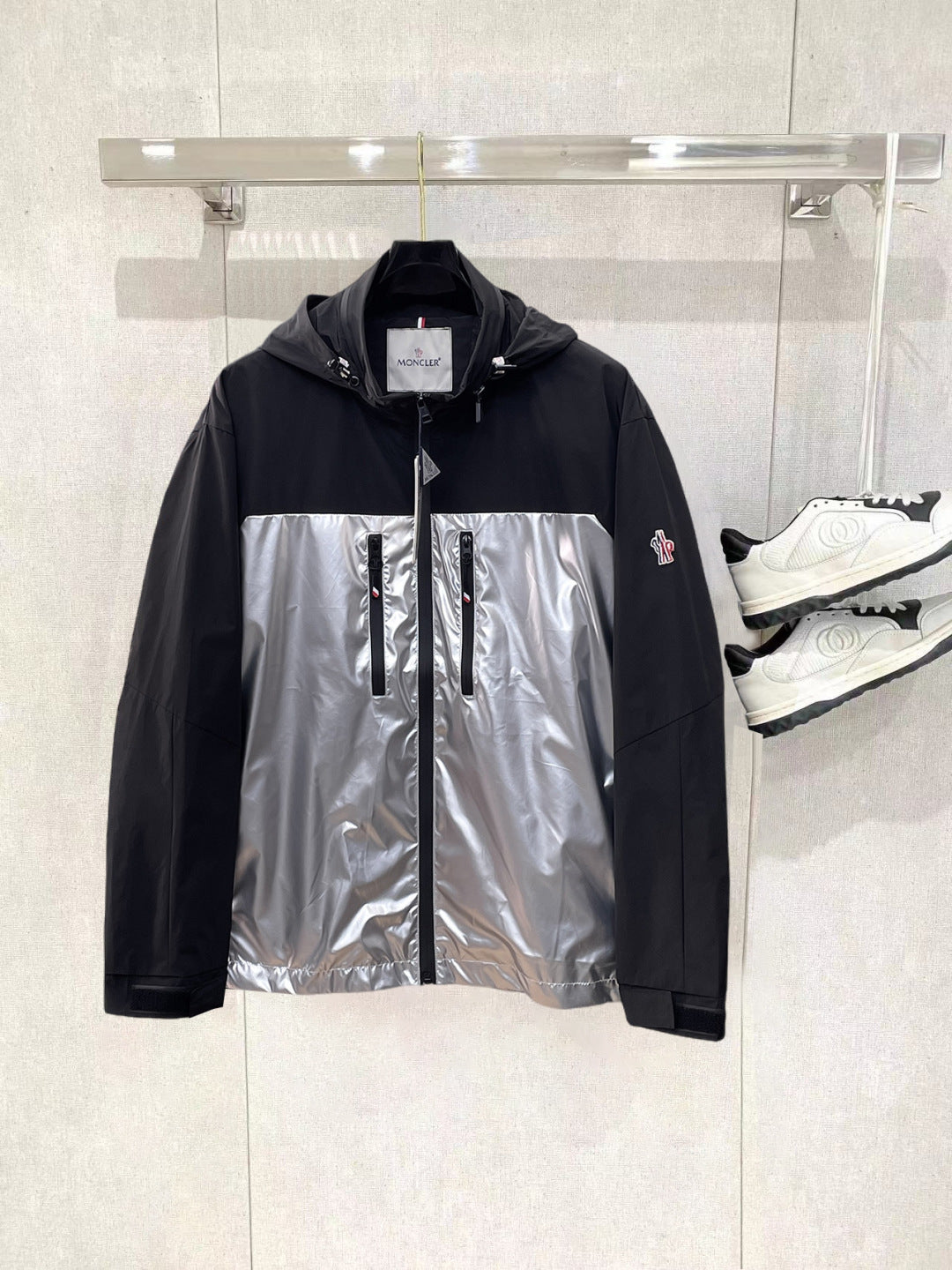 Moncler long hooded jacket, black sleeves with silver center panel and zip front