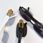 Assorted sunglasses with mixed lens tints, gold hardware and black frames