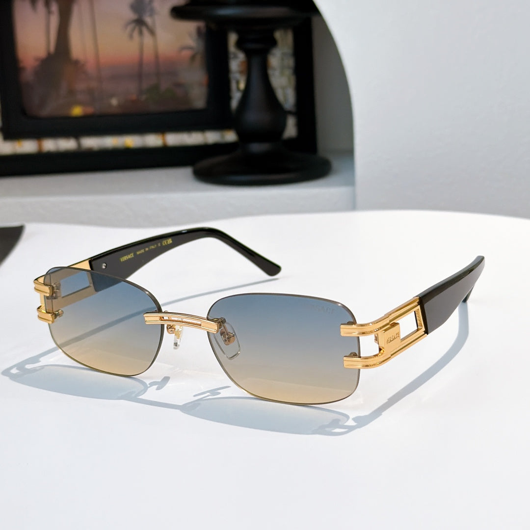 Sunglasses with light blue lenses and gold frame, geometric temple details