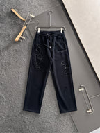 Navy drawstring sweatpants with elastic waistband and embroidered Givenchy Paris graphic
