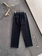 Navy drawstring sweatpants with elastic waistband and Givenchy Paris graphic on the front