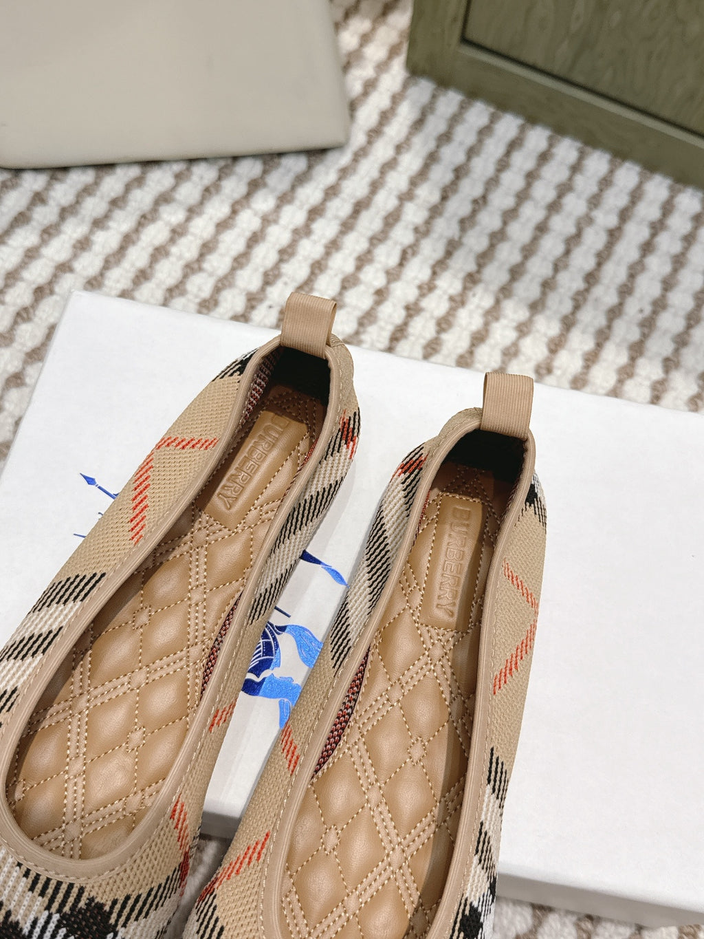 Burberry check ballet flats viewed from inside, tan cushioned footbed