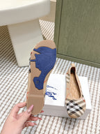 Burberry ballet flat outsole with blue tread, pair shown with top view