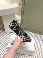 Burberry side view slip-on shoes, black-and-white check fabric upper