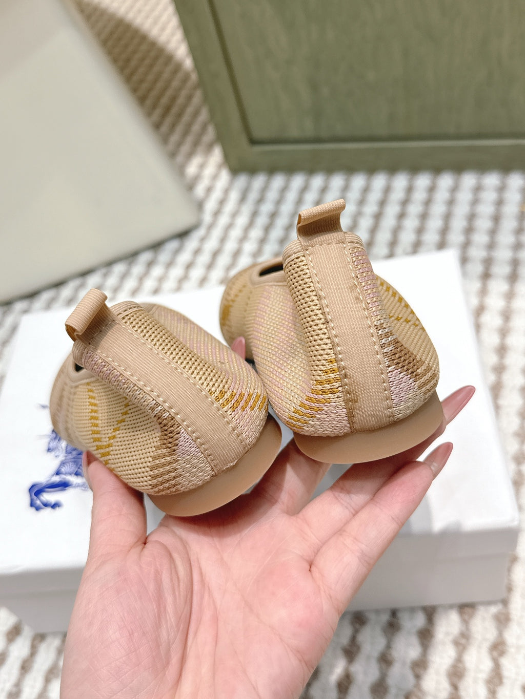 Burberry check-pattern flats, beige slip-on style with visible elastic trim