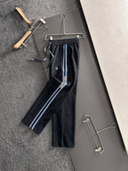 Dior pants with elastic waist and drawstring, dark legs with blue side stripe detail