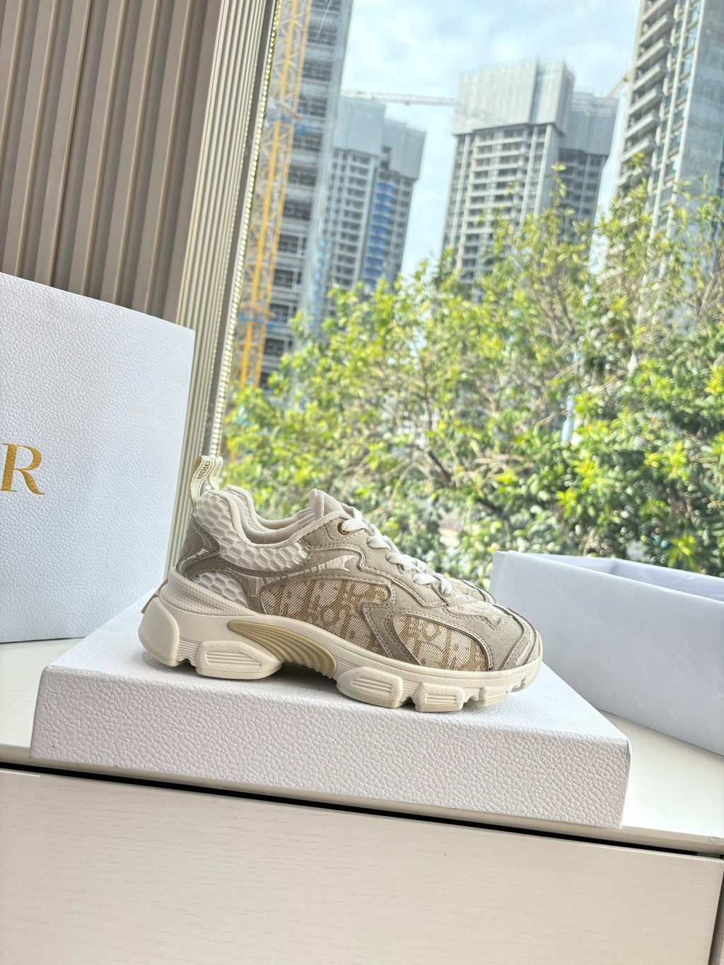 Beige lace-up sneakers on display with chunky sole