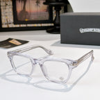 Transparent eyeglasses with clear lenses and metal temple accents.