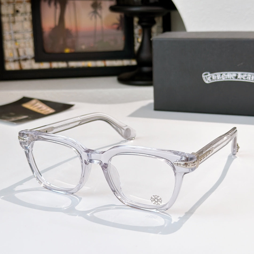 Transparent eyeglasses with clear lenses and metal temple accents.