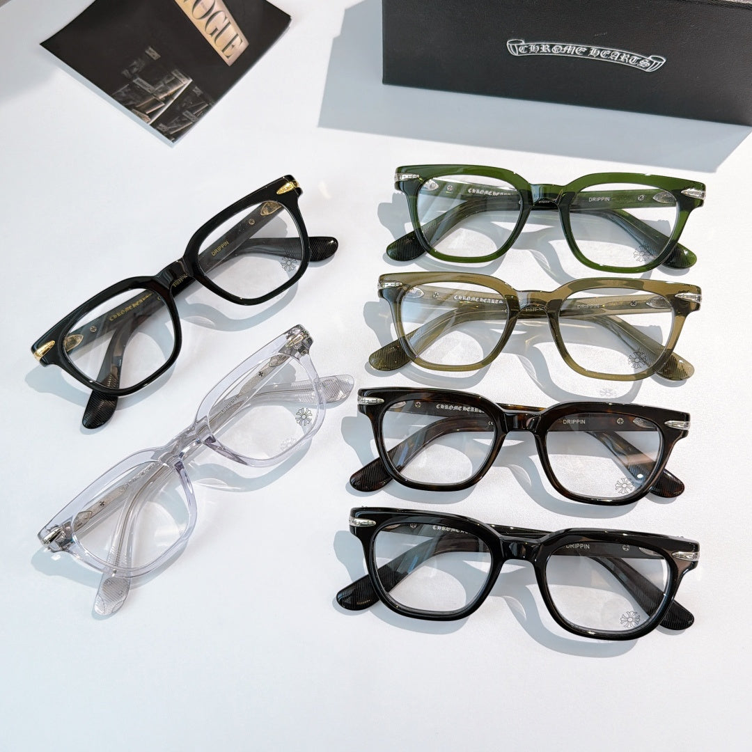 Assorted eyeglasses set with green, brown, black, and transparent frames.