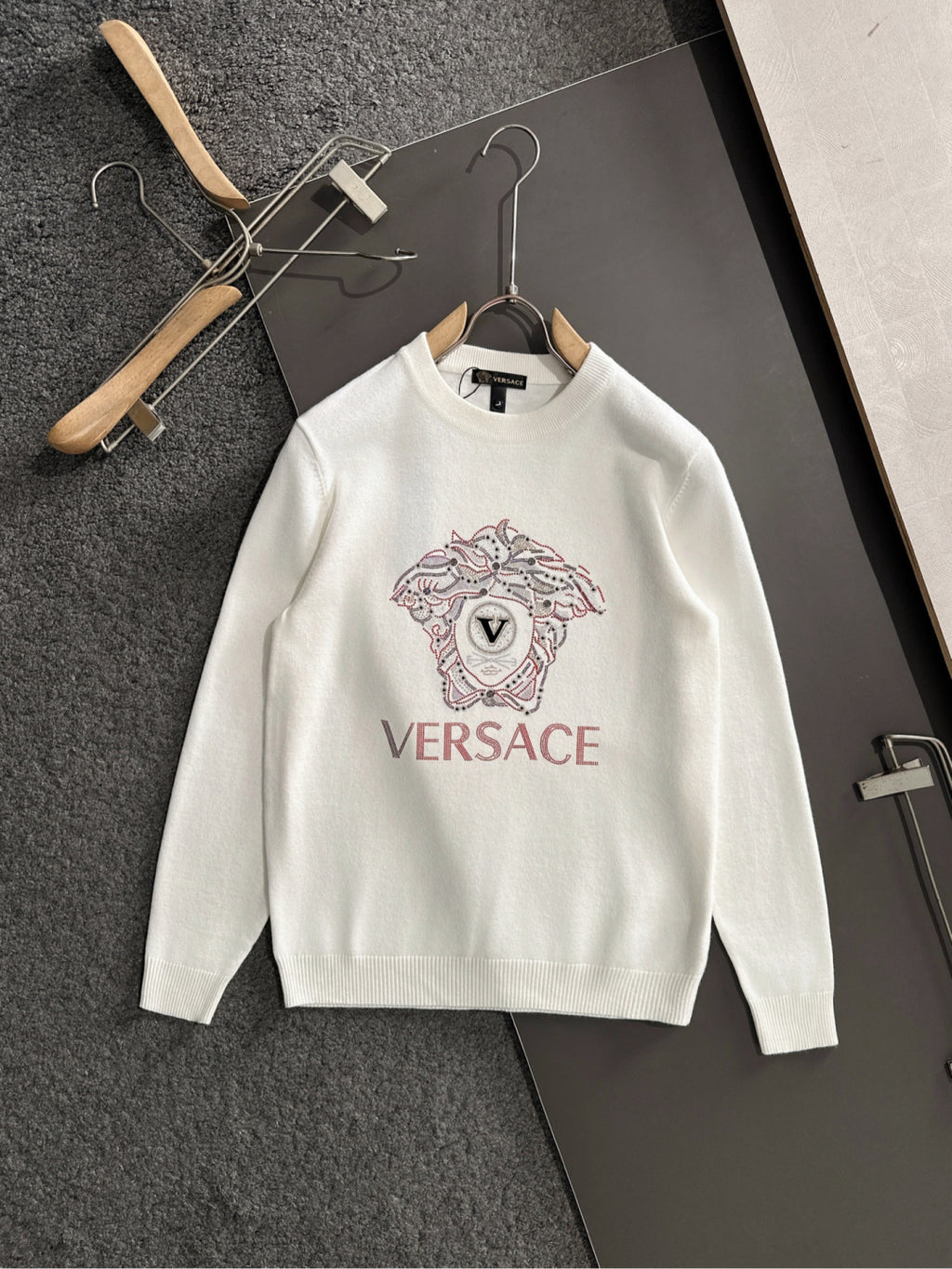 White Versace crewneck sweatshirt with rhinestone dog graphic on the chest