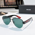 Aviator sunglasses with dark teal lenses and black frame, red logo temple detail