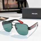 Prada aviator sunglasses with black frame and green gradient lenses