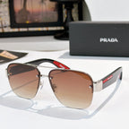 Prada aviator sunglasses with silver frame and light brown gradient lenses