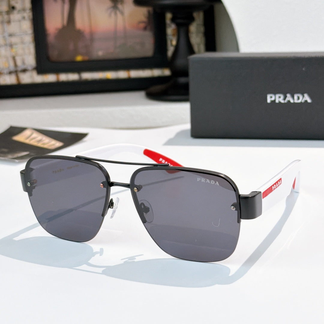 Prada aviator sunglasses with dark frame and dark gray gradient lenses