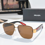 Prada aviator sunglasses with gold frame and brown gradient lenses