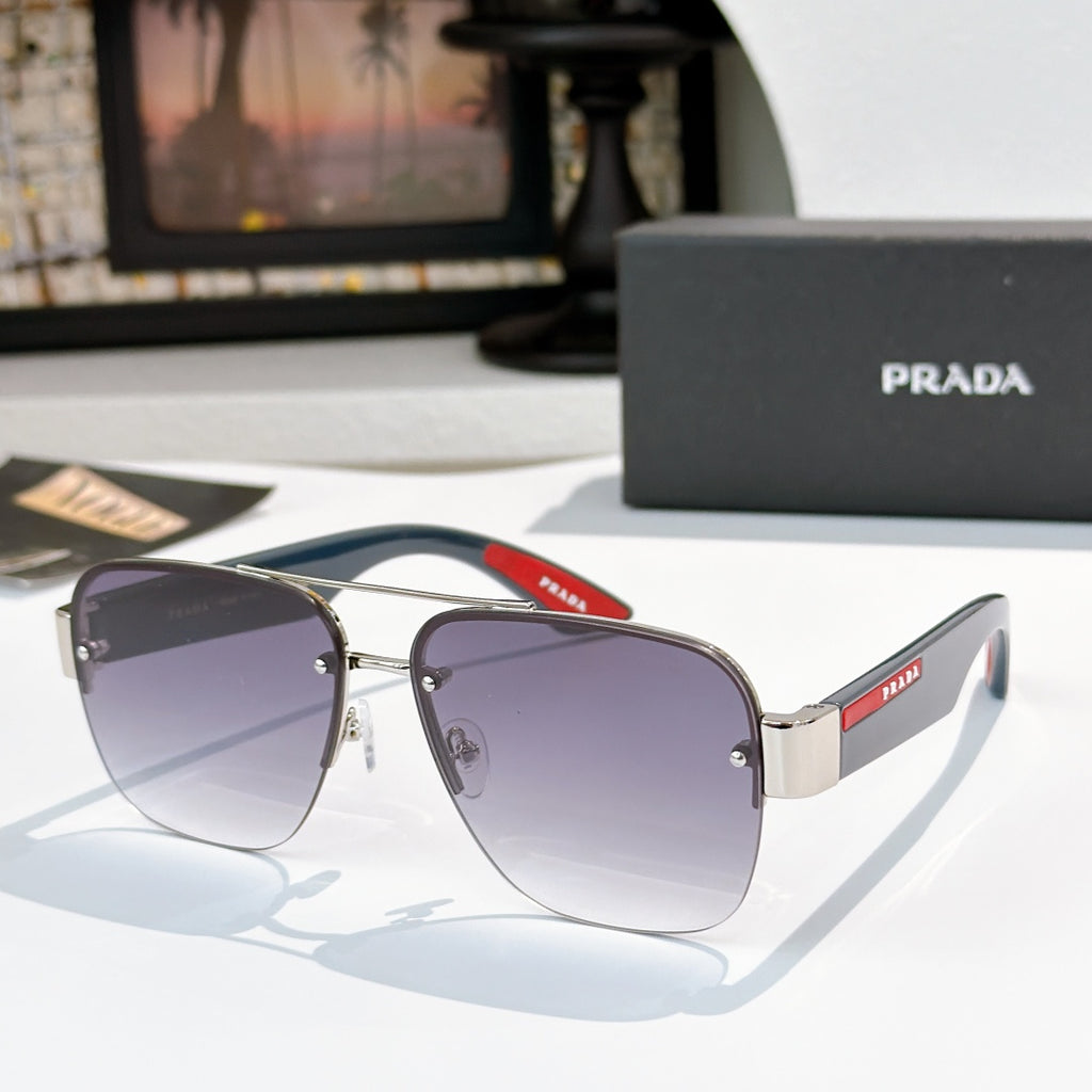 Prada aviator sunglasses with silver frame and purple gradient lenses