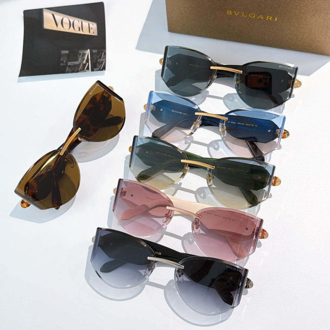 Bvlgari sunglasses display with multiple cat-eye styles in mixed frame colors.